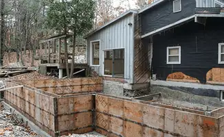 Prepared site with foundation forms for home remodeling and addition project in Santa Ana, CA