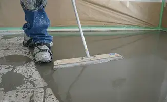 Uneven floor being professionally repaired in Santa Ana, CA